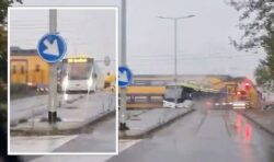 Passenger train crashes into broken down bus at crossing in the Netherlands – video