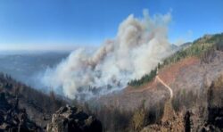 Thousands flee raging wildfire in north-western US as evacuation orders issued