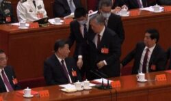 Frail former Chinese president, 79, is mysteriously forced from party congress hall