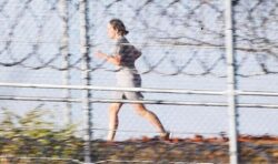 Ghislaine Maxwell spotted running around US prison track in grey shorts and t shirt