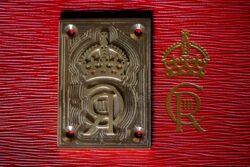 Brass die will emboss King’s cypher on to famous red boxes