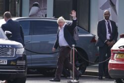 Boris Johnson jets back to UK as Tories split on his expected leadership bid