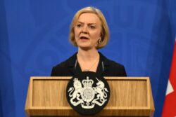 Truss defends her low tax agenda as she makes major U-turn and sacks Chancellor