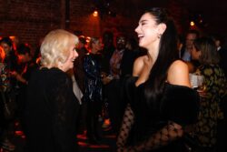 Dua Lipa has a right laugh with Queen Camilla after cracking joke at Booker Prize awards 2022