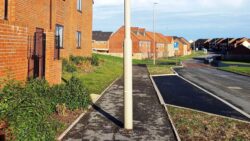 Bungling workmen shift lamppost after planting it in MIDDLE of path