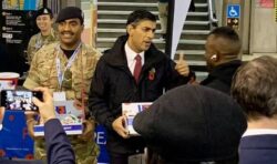 Rishi Sunak spotted selling poppies during rush hour at Westminster Tube Station