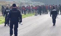 Lifejacket clad migrants clash with French police in Dunkirk as mass boat launch foiled