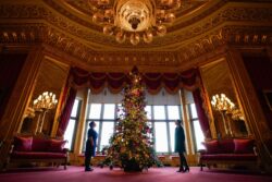 In Pictures: Royal staff deck Windsor Castle hall with 20ft Christmas tree