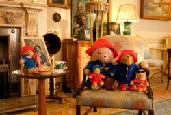 Paddington Bears left in memory of the Queen pictured exploring Buckingham Palace