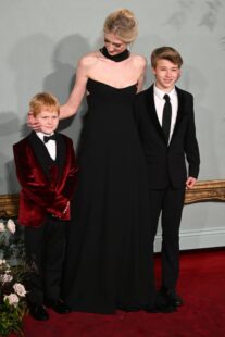 The Crown’s Elizabeth Debicki looks after young Prince Harry and William stars on red carpet for season 5 premiere