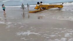 Pilot’s lucky escape after crashing onto beach upside down