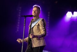 Westlife’s Nicky Byrne shows off nasty bruises after worrying fans by falling off stage