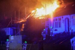 Bungalow engulfed in flames after ‘explosion’ on London street