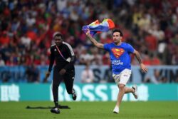 Pitch invader carrying Pride flag interrupts Portugal vs Uruguay in World Cup clash