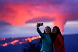 Thousands flock to world’s largest volcano for a selfie during eruption