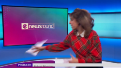 Newsround presenter accidentally throws script into air before styling it out like a pro