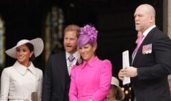 Mike Tindall spotted cutting shapes in background of Harry and Meghan’s wedding photo