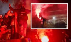 France in flames: Riot police clash with Morocco fans in tense scenes after World Cup win