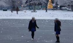Two schoolgirls seen playing on frozen pond just hours after boys die in icy lake tragedy