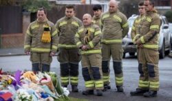 Heartbroken firefighters lay flowers for three boys who died in iced-over lake in Solihull