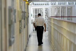 Inspector warns of reoffending risk as prisoners locked in cells 23 hours a day