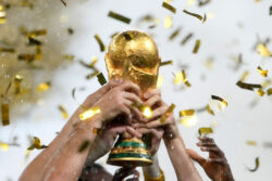 What is the World Cup trophy made out of and how much does it weigh?