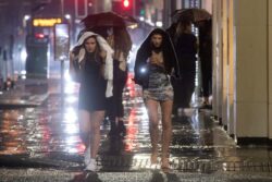 New Year’s Eve partygoers face rain, snow and ice with warnings issued