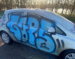 Woman who abandoned car after icy crash comes back to find it covered in graffiti