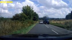 Reckless driver overtakes tractor on blind bend and nearly causes head-on crash