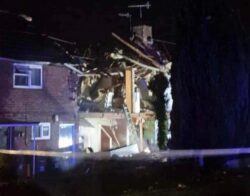 House destroyed and street evacuated after suspected gas explosion