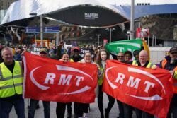 Strikes news – live: Postal workers walkout as UK braces for week of transport chaos