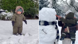 Perrie Edwards’ son Axel, 1, could not be cuter as he makes his first snowman in adorable snowsuit