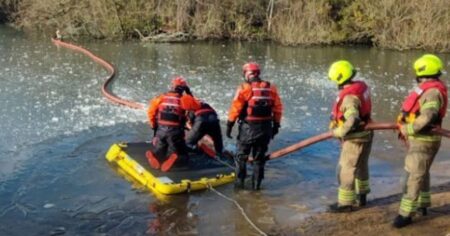 Teenager and dog rescued from icy pond as temperatures plunge