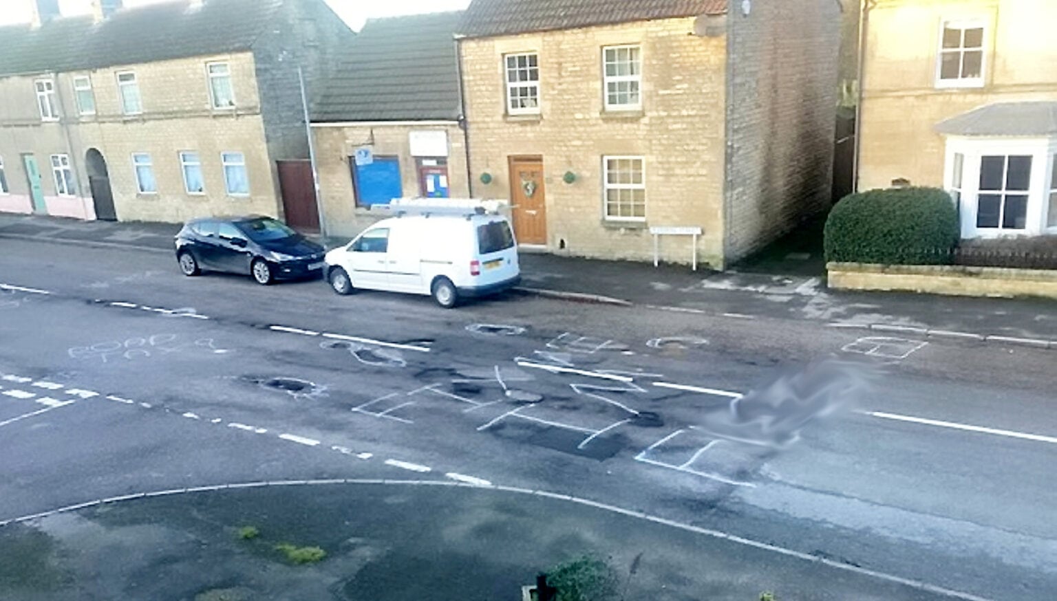 Residents fed up with potholes write ‘Fix me, I’m f****d’ on the street