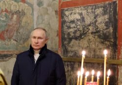 Vladimir Putin spends Orthodox Christmas service alone in Kremlin