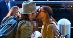 Loved up Zoe Saldana snogs husband at LA airport following Avatar: The Way of Water success