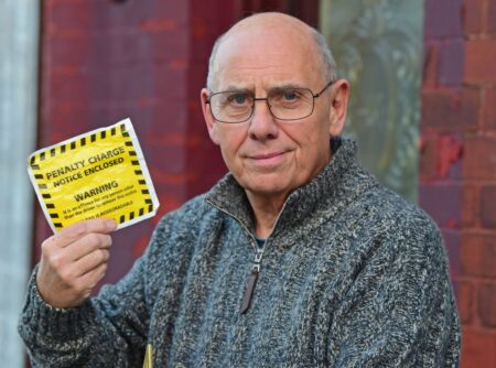 Fuming driver handed ticket for parking outside home he’s lived in for 40 years