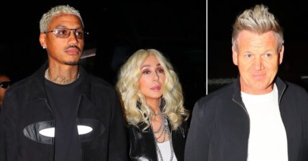 Cher, 76, holds hands with boyfriend Alexander Edwards, 36, as they join Gordon Ramsay at star-studded party