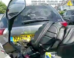 Disqualified driver injured motorbike cop by reversing into him and speeding off