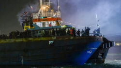 More than 1,300 migrants brought ashore in Italy as locals march for shipwreck victims