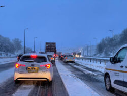 UK weather – latest: Snow causes ‘absolute carnage’ on roads as Storm Larisa sees drivers stuck overnight