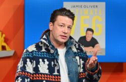 Jamie Oliver pulls leopard print trolley behind him in fresh-faced throwback from 20 years ago 