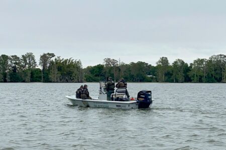 Two boaters missing after leaping into lake to save woman