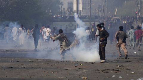 Pakistan police fire teargas after protesters try to prevent arrest of Imran Khan

