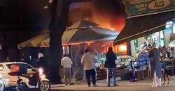 Diners flee as masked gang set fire to restaurant in terrifying knife raid