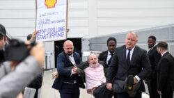 ‘Go to hell, Shell’: More than 100 climate activists storm annual shareholder meeting