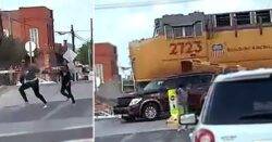 Moment mum and daughter escape from car hand-in-hand just before train slams into it