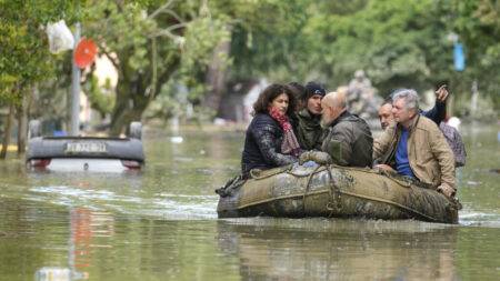 Death toll rises from Italy floods as thousands wait to come home