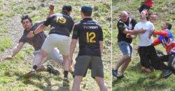 Flailing limbs everywhere as competitors tumble after cheese rolling down a hill