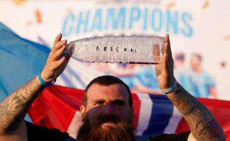 Manchester City fan mocks Arsenal during Premier League title celebrations outside Etihad Stadium